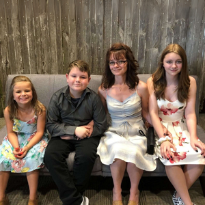Family photo with mother and 3 children