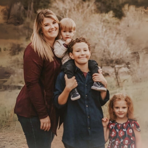 Family photo of mother with 3 children