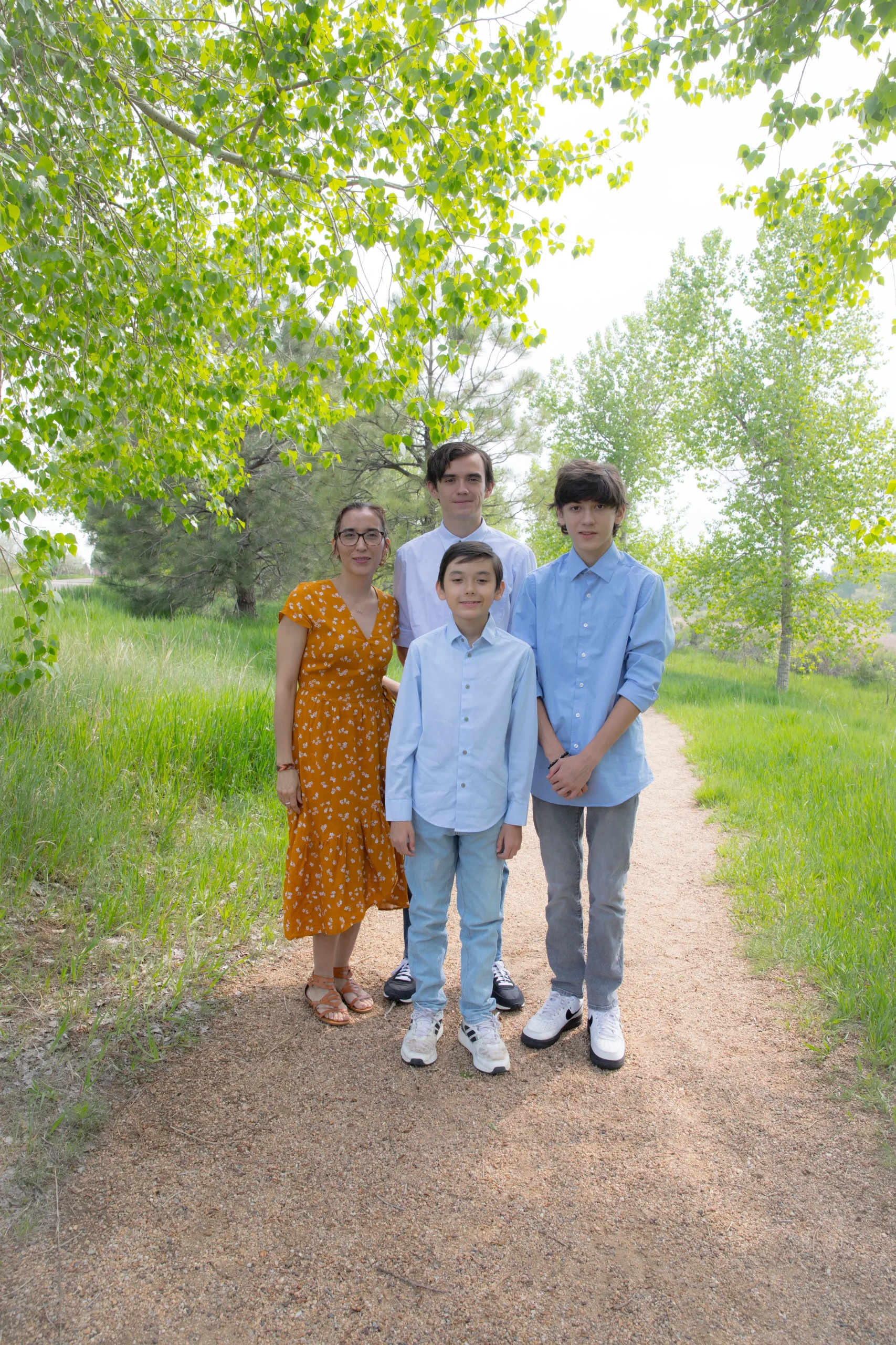 Zaira and her sons on a park trail