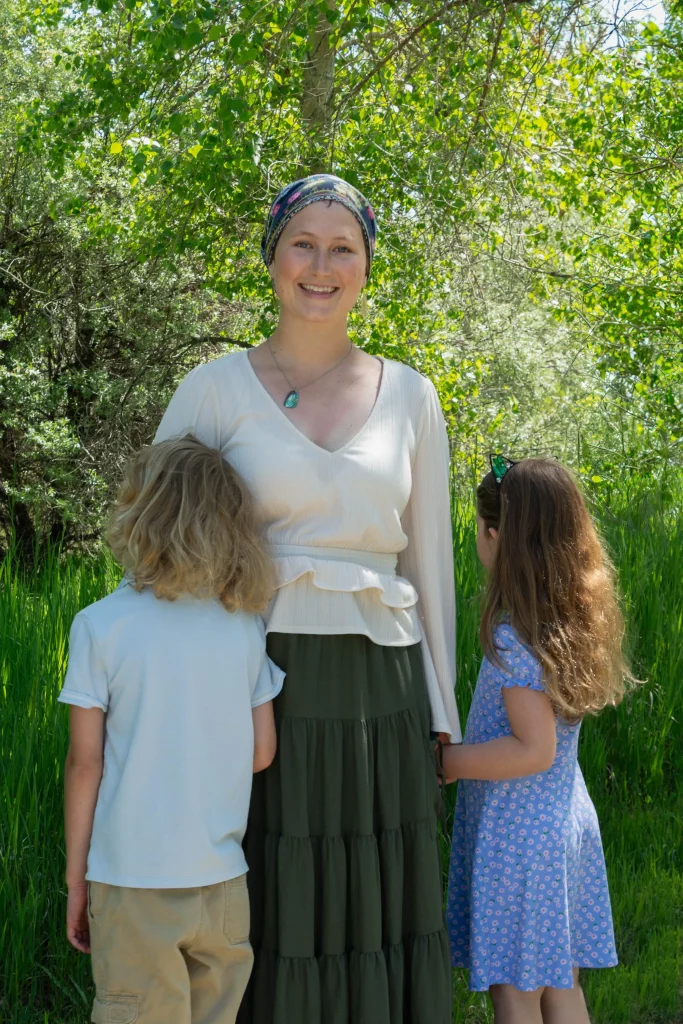 Sarah and her kids in a park